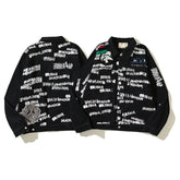 American-style baseball jacket Stu x Tears American High-Street Collaboration: Denim Jacket Featuring All-Over Barrage Text Print and Embroidered Cotton Boll Motifs.