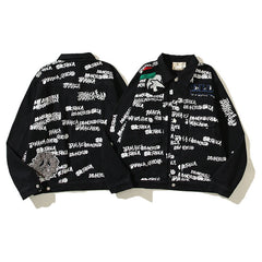American-style baseball jacket Stu x Tears American High-Street Collaboration: Denim Jacket Featuring All-Over Barrage Text Print and Embroidered Cotton Boll Motifs.