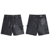Gallery Dept Denim Shorts Black waxed-finish work pants featuring paneled denim detailing at the knees—a versatile, high-street style piece.