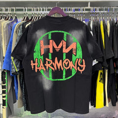 Harmony T Shirts Cement-wash, distressed-look, and hot-fix rhinestone application.