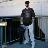 Mens T-shirt Vintage Kanye x Cactus Jack collaboration featuring Hiroshi Fujiwara's Fragment lightning bolt graphic.