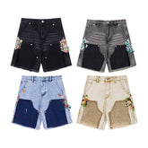 Gallery Dept Denim Shorts Street-style casual shorts featuring a mix of styles—including paint-splatter and woodcutter-inspired paneling—crafted from washed denim. Versatile and trendy.