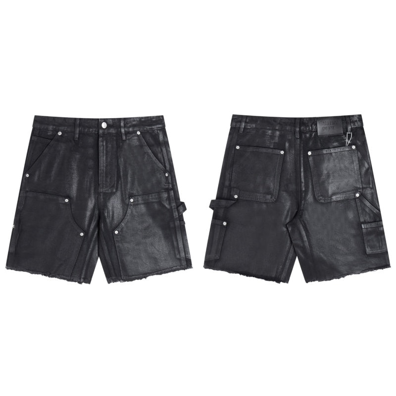 Gallery Dept Denim Shorts Black waxed-finish work pants featuring paneled denim detailing at the knees—a versatile, high-street style piece.