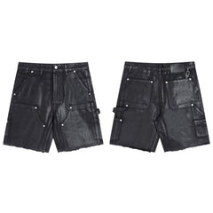 Gallery Dept Denim Shorts Black waxed-finish work pants featuring paneled denim detailing at the knees—a versatile, high-street style piece.