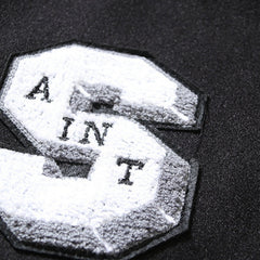 American-style baseball jacket High-street Saint of God American-style color-block varsity jacket for men; loose-fit unisex design featuring leather sleeves and a wool-blend body.